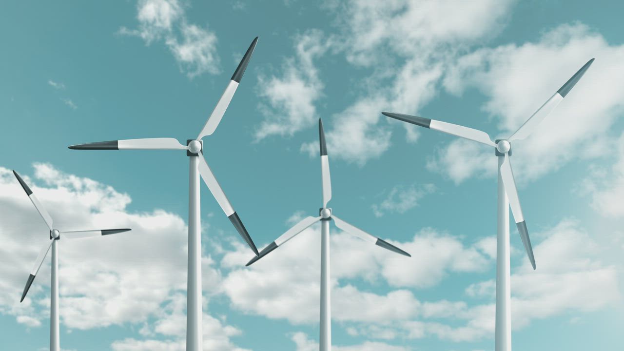 Wind turbines against a blue sky